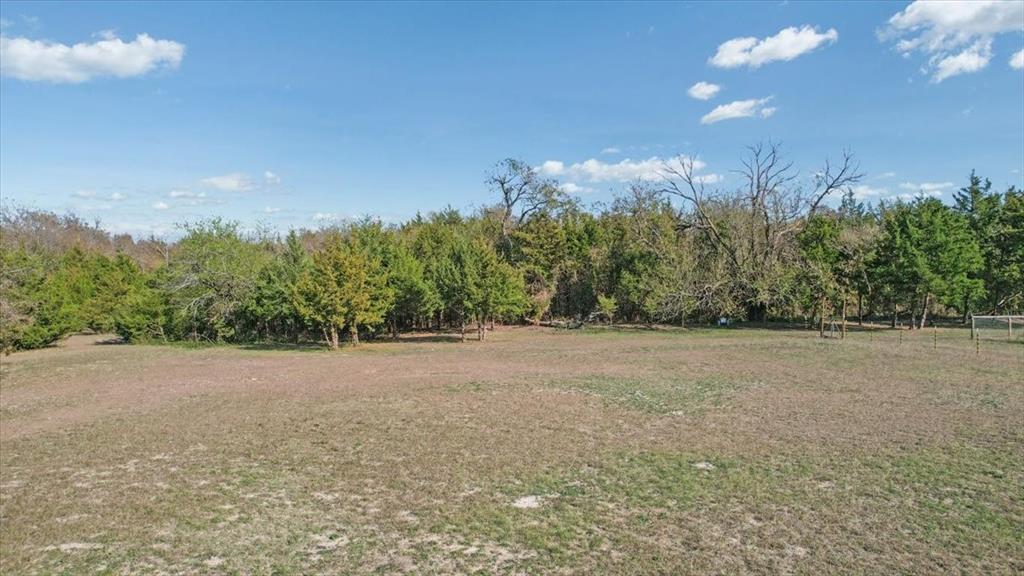 567 Celtic Road Howe, TX 75459 - Photo 39 of 40 a view of a field with trees in background