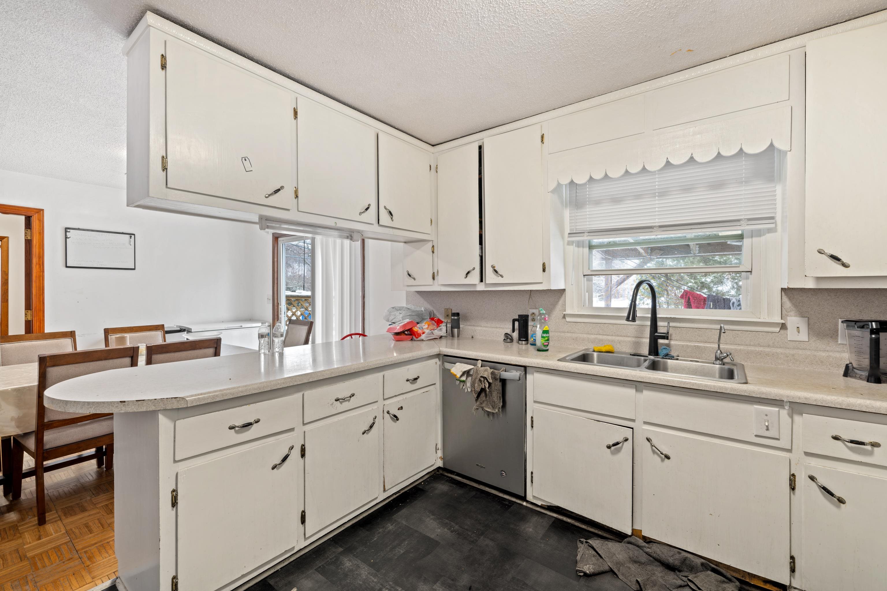 728 Foley Road Harrisonburg, VA 22801 - Photo 16 of 62 a kitchen with cabinets appliances a sink and a window