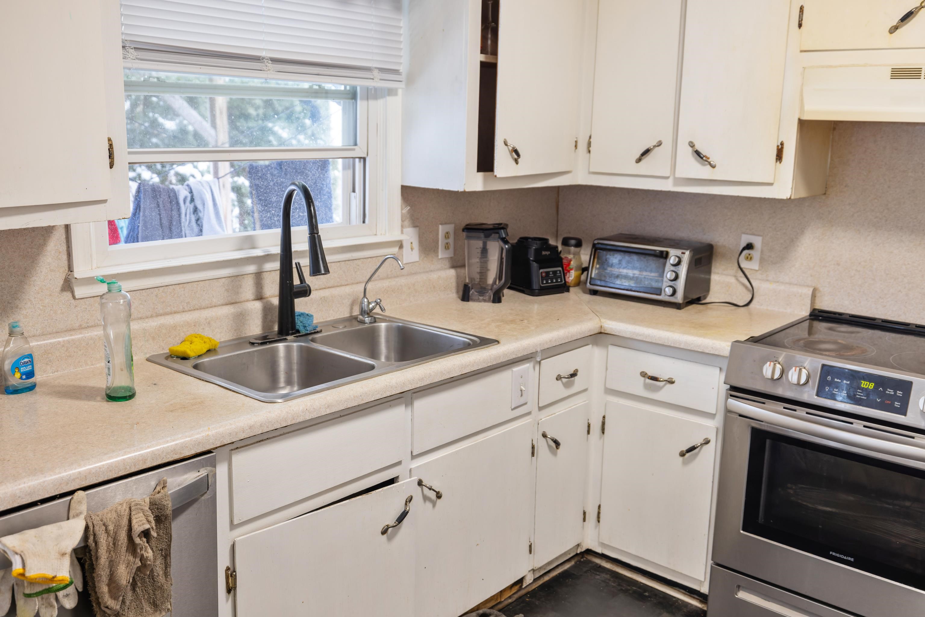 728 Foley Road Harrisonburg, VA 22801 - Photo 18 of 62 a kitchen with stainless steel appliances granite countertop a sink and a white cabinets