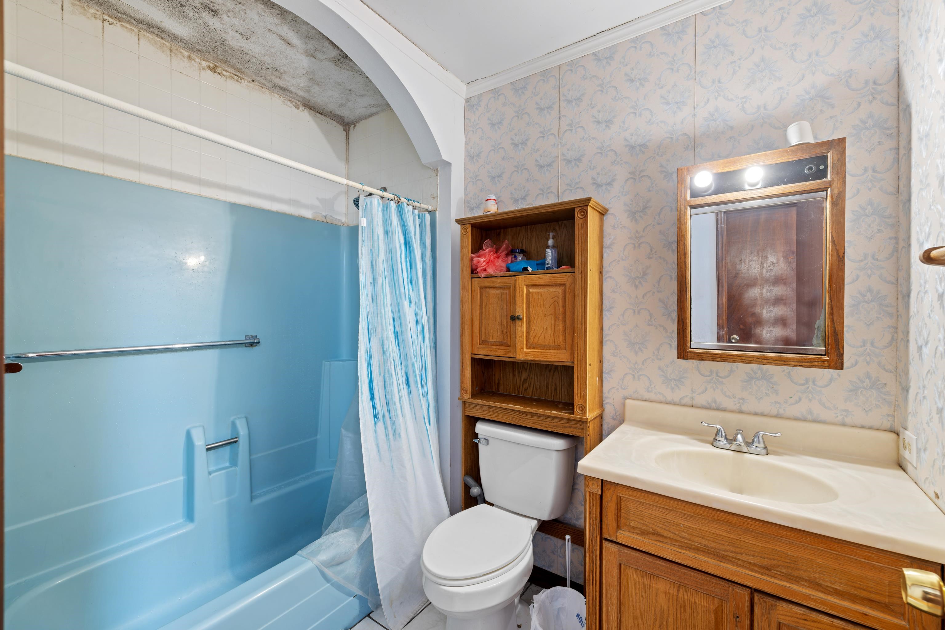 728 Foley Road Harrisonburg, VA 22801 - Photo 36 of 62 a bathroom with a sink a toilet and shower