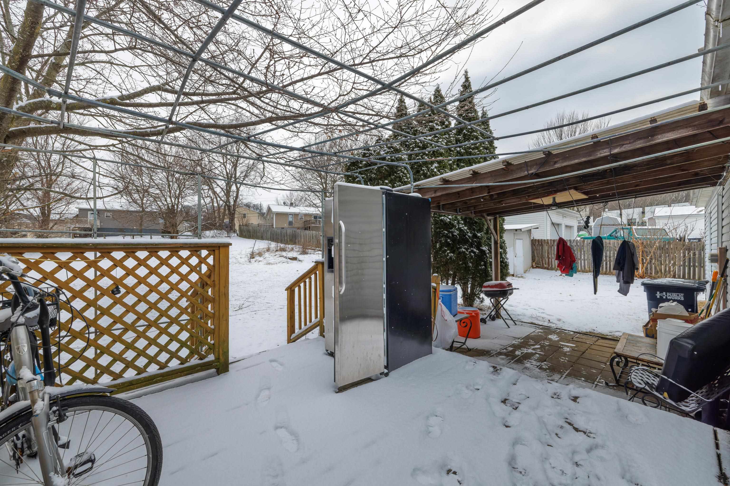 728 Foley Road Harrisonburg, VA 22801 - Photo 40 of 62 a view of a patio with table and chairs