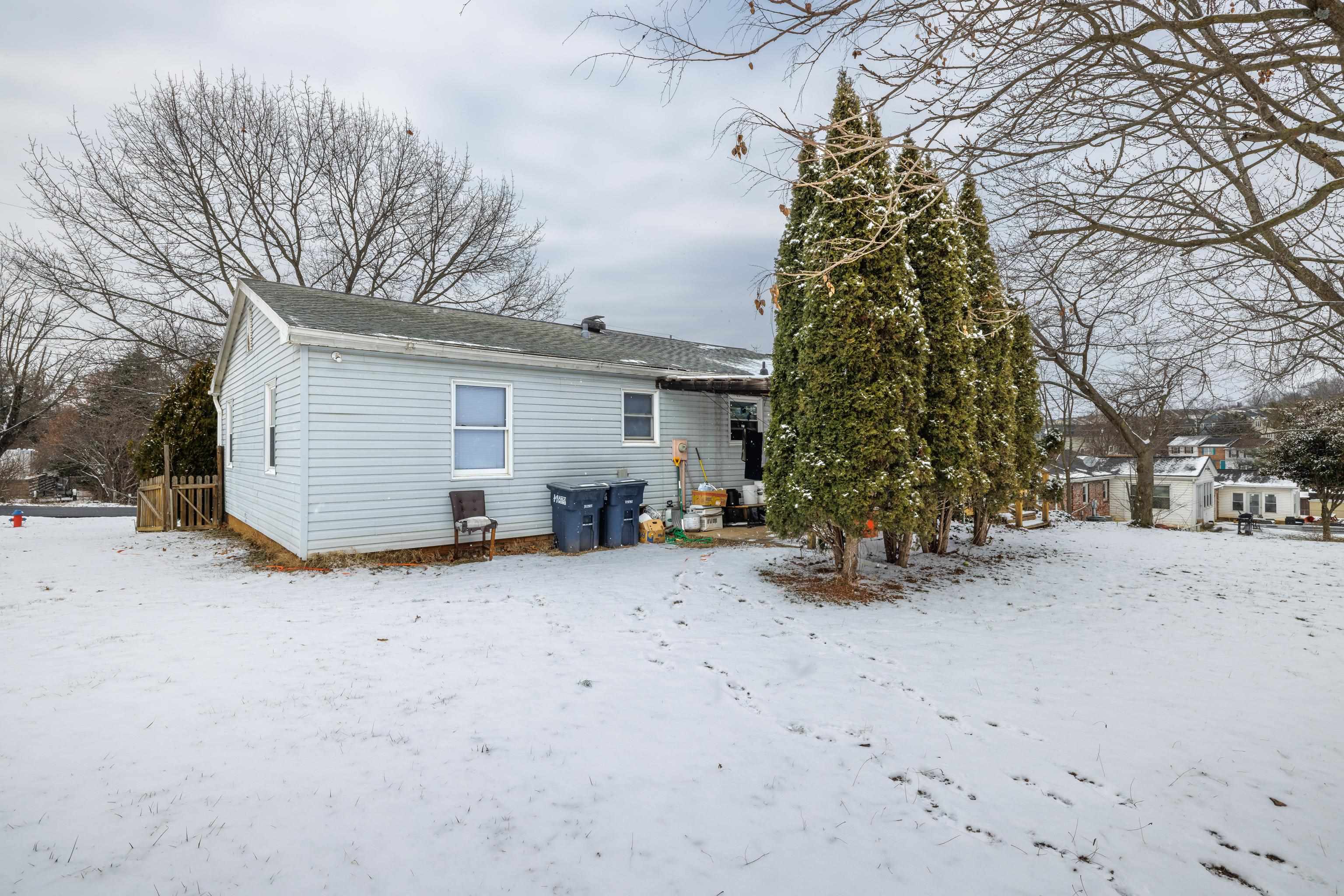 728 Foley Road Harrisonburg, VA 22801 - Photo 43 of 62 a view of a house with a snow in the yard