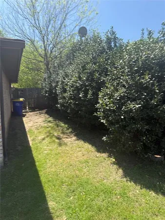 a view of swimming pool from a yard