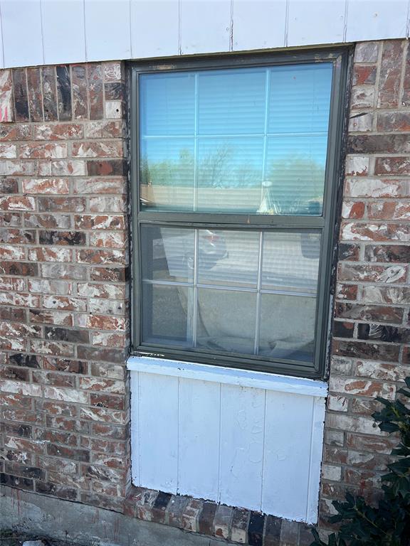 6036 Harrison Way Watauga, TX 76148 - Photo 13 of 39 Exterior view of brick siding