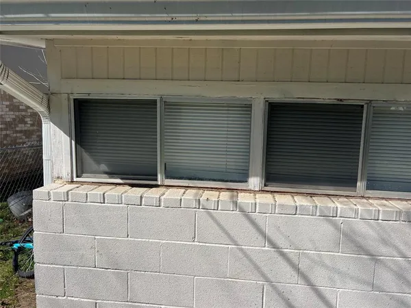 a view of house with garage