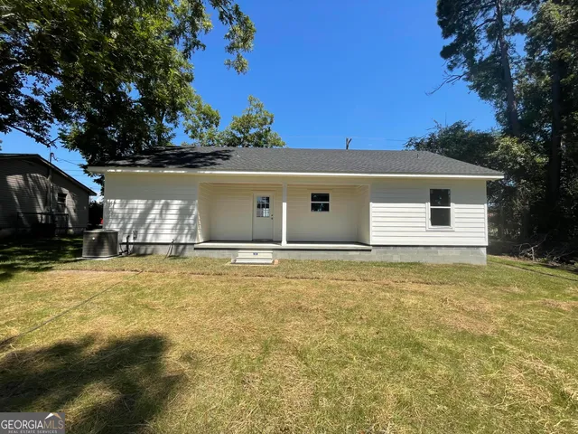 a view of house with outdoor space