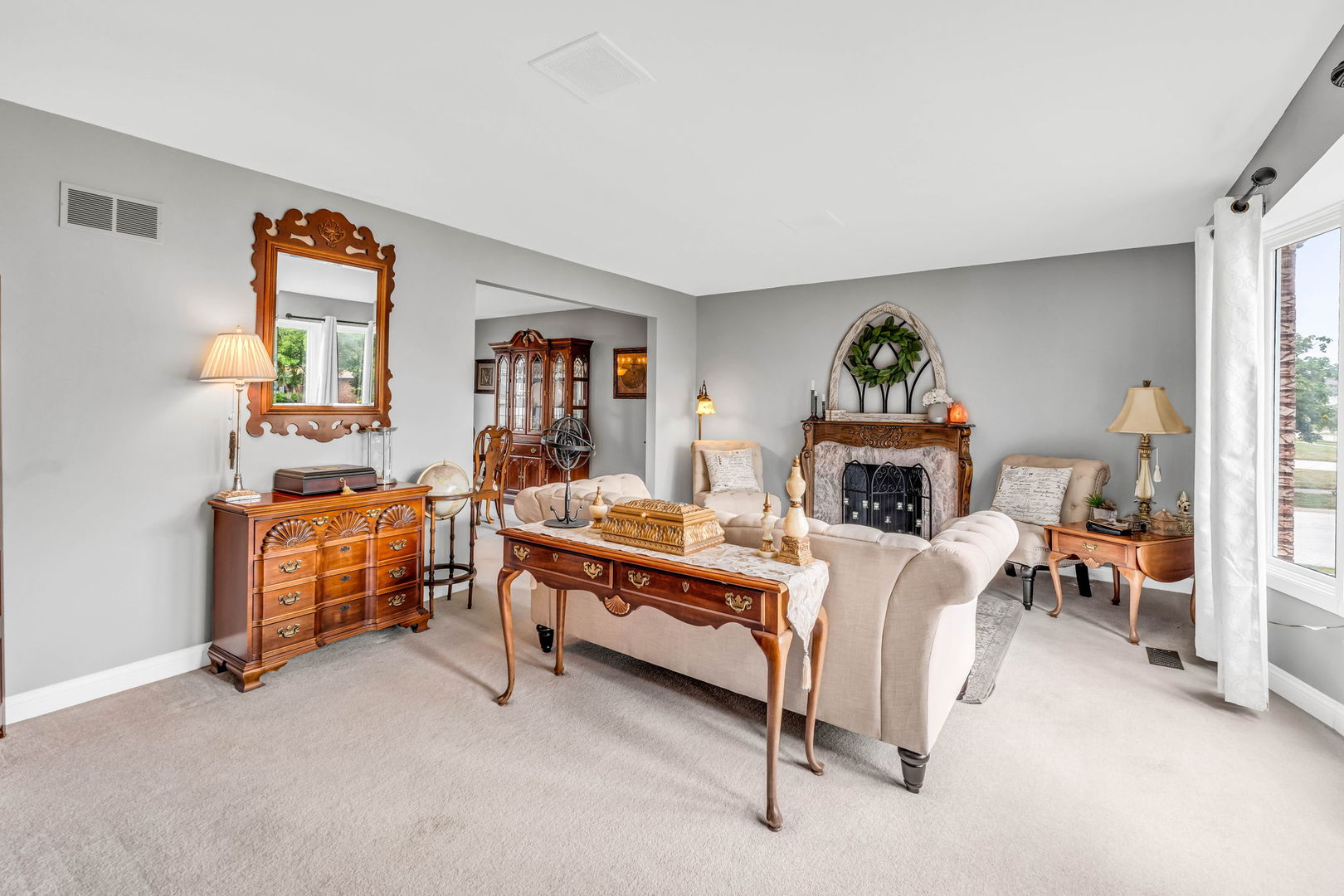 15624 Sunset Ridge Drive Orland Park, IL 60462 - Photo 4 of 37 a bed room with furniture and a fireplace