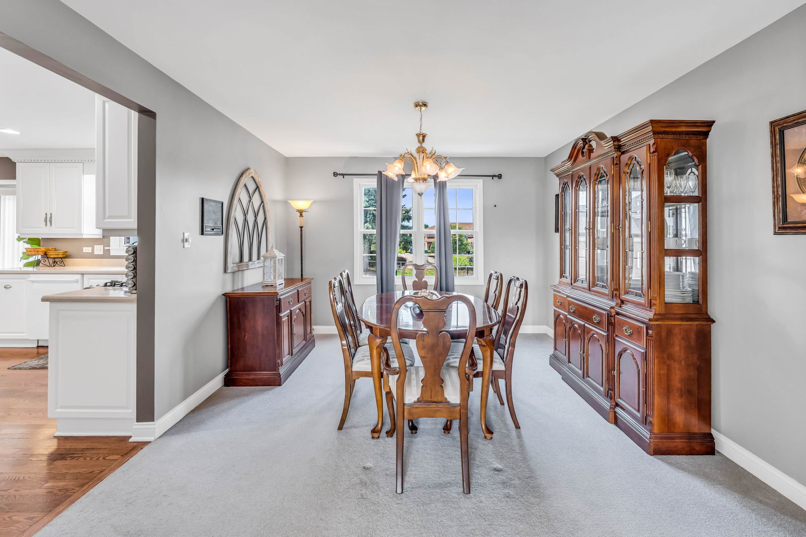 15624 Sunset Ridge Drive Orland Park, IL 60462 - Photo 7 of 37 a dining room with furniture and window