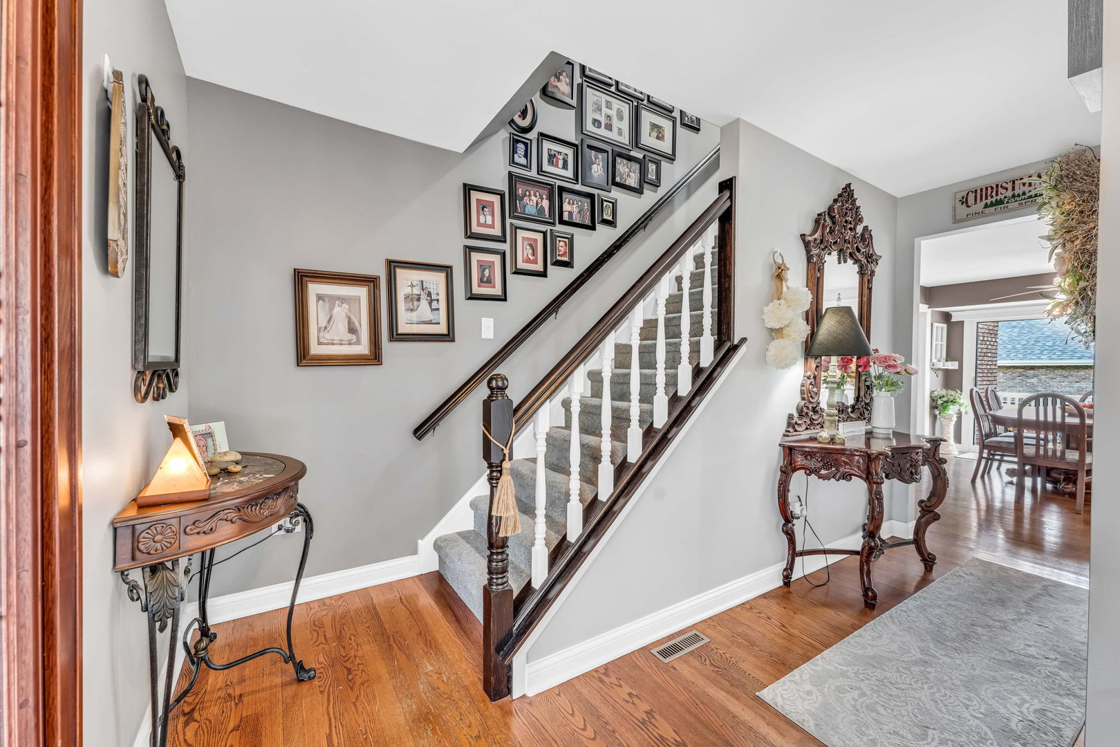 15624 Sunset Ridge Drive Orland Park, IL 60462 - Photo 9 of 37 a view of entryway livingroom and hall with wooden floor