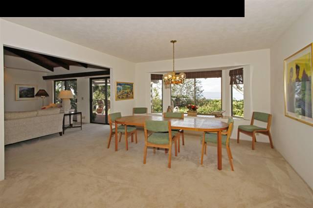 1365 Lower Kula Road Kula, HI 96790 - Photo 15 of 30 a dining room with furniture a chandelier and a rug