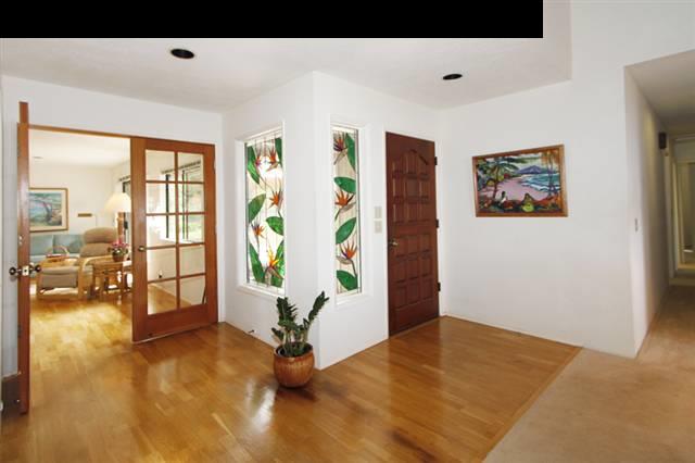 1365 Lower Kula Road Kula, HI 96790 - Photo 17 of 30 a view of an empty room with window and hardwood floor