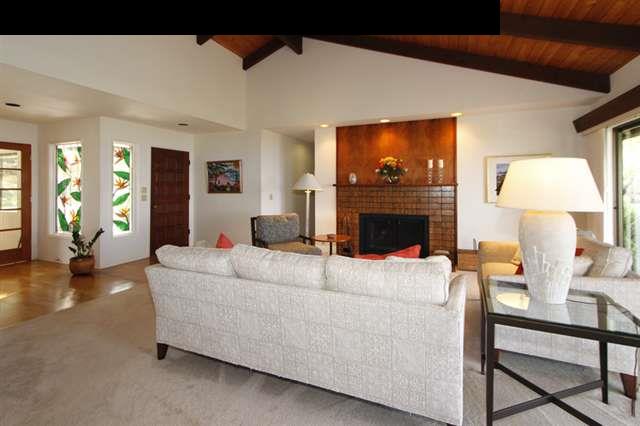 1365 Lower Kula Road Kula, HI 96790 - Photo 2 of 30 a living room with furniture and a fireplace