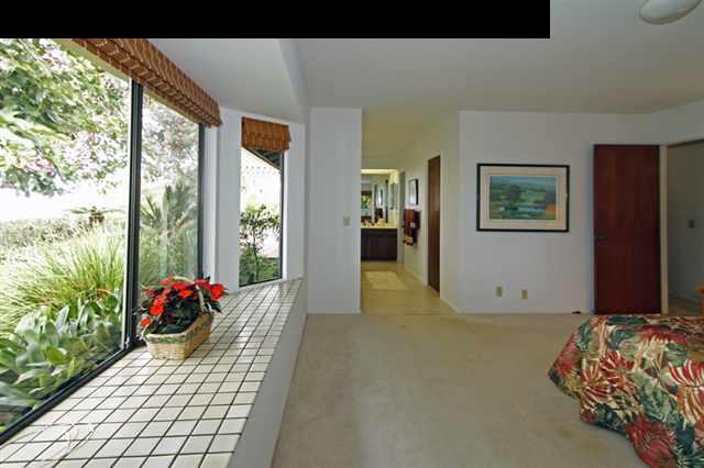 1365 Lower Kula Road Kula, HI 96790 - Photo 22 of 30 a living room with furniture and a potted plant