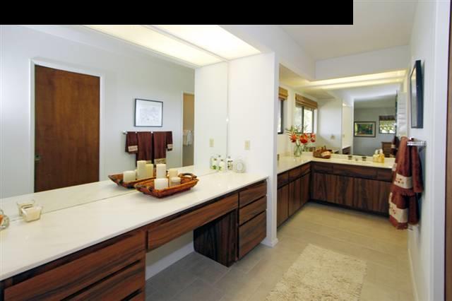 1365 Lower Kula Road Kula, HI 96790 - Photo 23 of 30 a kitchen with a sink and a stove top oven