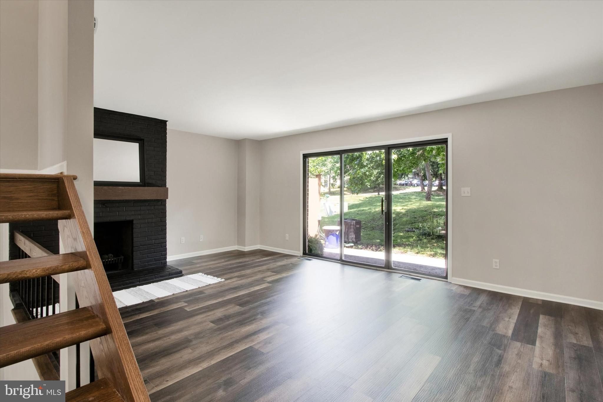 33 Pinehurst Court Reading, PA 19607 - Photo 10 of 30 a view of an empty room with wooden floor and a window