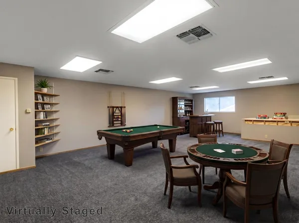 a room with furniture and a table
