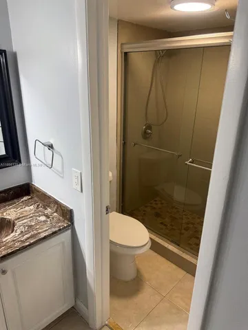 an empty room with a fireplace