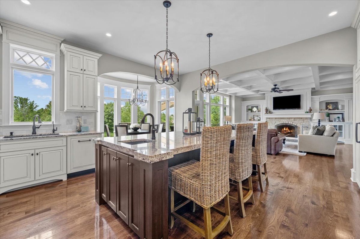 754 Wild Ginger Road Sugar Grove, IL 60554 - Photo 14 of 52 a large kitchen with a table and chairs