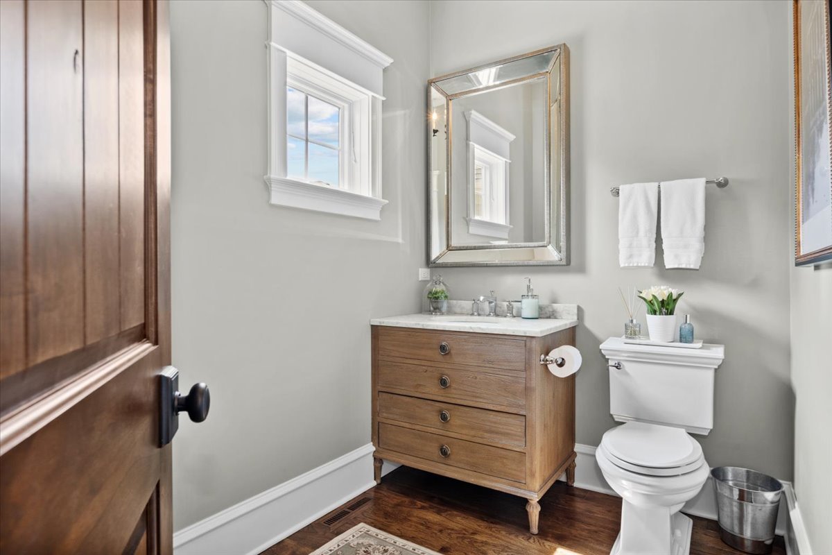 754 Wild Ginger Road Sugar Grove, IL 60554 - Photo 21 of 52 a bathroom with a toilet sink and mirror