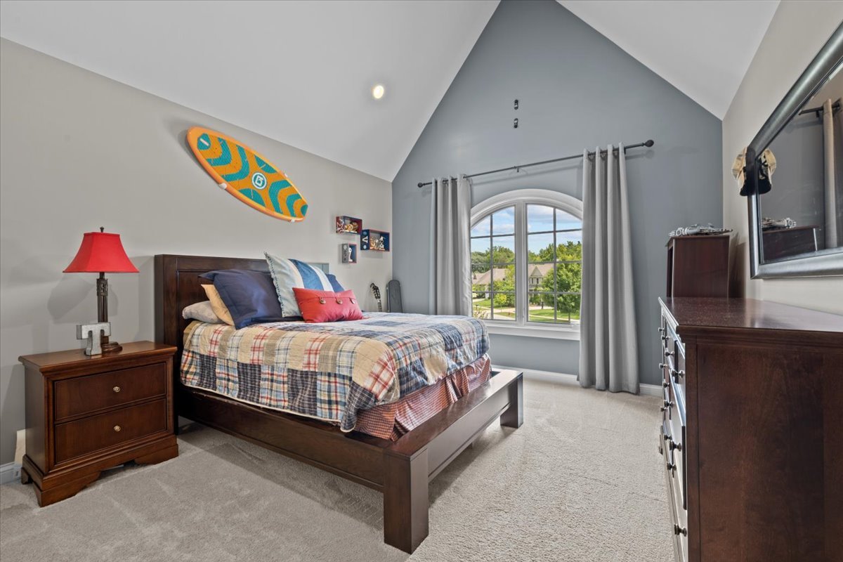 754 Wild Ginger Road Sugar Grove, IL 60554 - Photo 36 of 52 a bedroom with a bed and a window