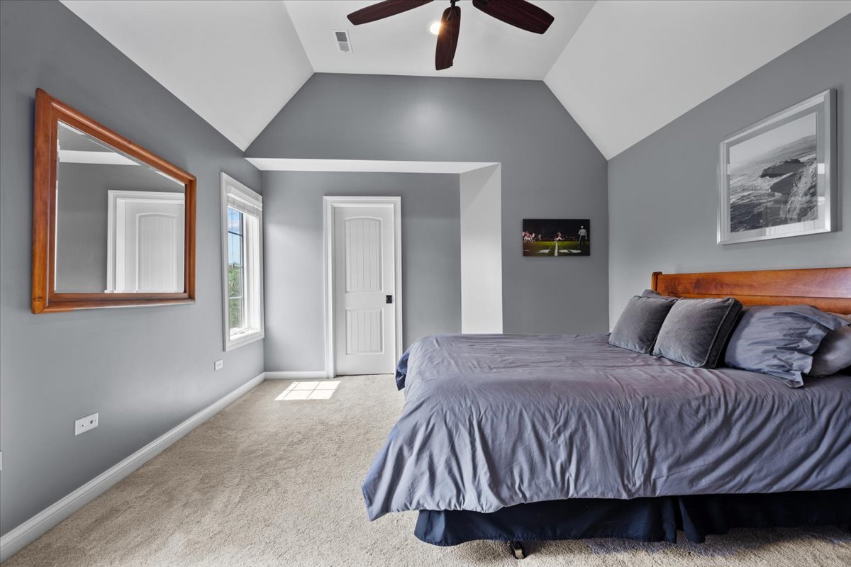 754 Wild Ginger Road Sugar Grove, IL 60554 - Photo 39 of 52 a bedroom with a bed and painting on the wall