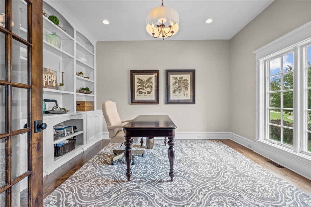 754 Wild Ginger Road Sugar Grove, IL 60554 - Photo 5 of 52 a living room with furniture and a window