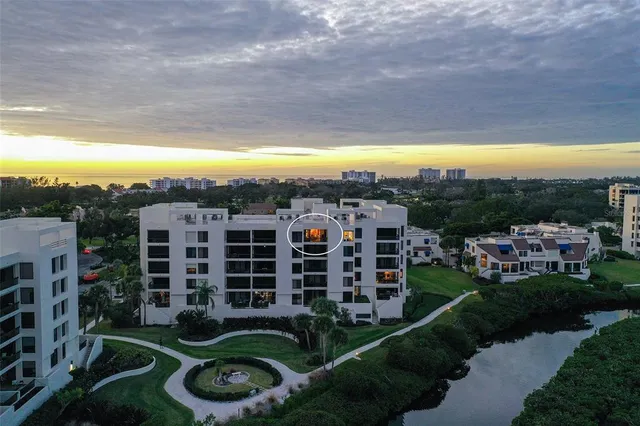 a view of a swimming pool with sitting area