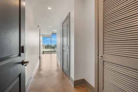 a flower garden is sitting in front of a house