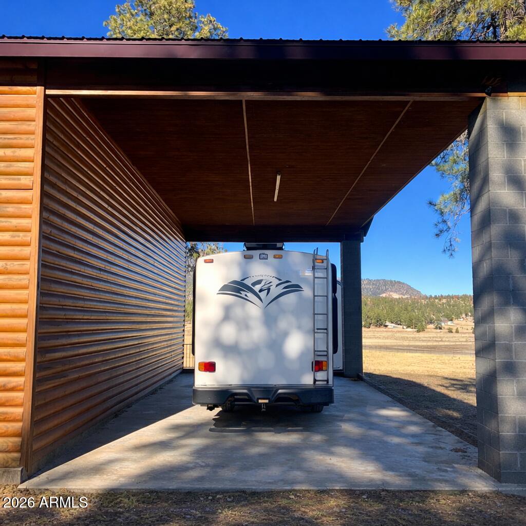 3 County Road Alpine, AZ 85920 - Photo 8 of 39 RV in forested parking area