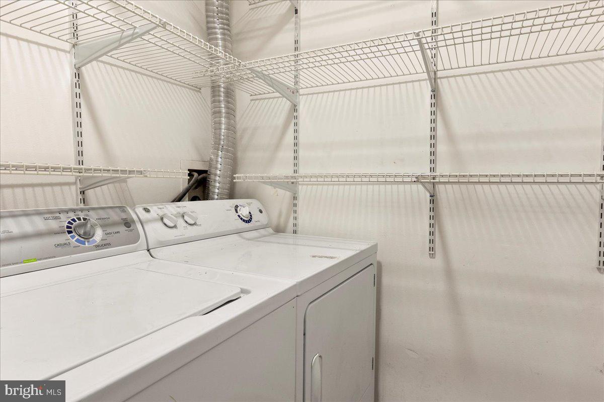 14903 Rydell Road, Unit 104 Centreville, VA 20121 - Photo 12 of 12 a bathroom with a sink and a shower
