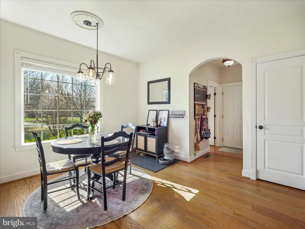 a view of a livingroom with workspace and a couch
