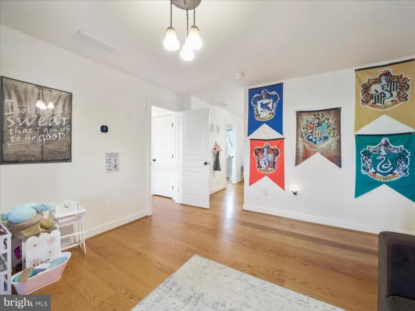 a living room with lots of furniture and a flat screen tv