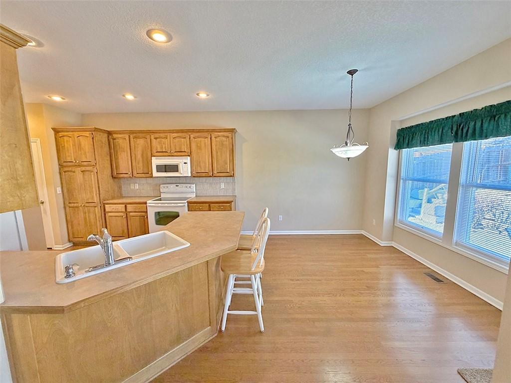 1112 Southwest Hoke Drive Lee's Summit, MO 64081 - Photo 12 of 94