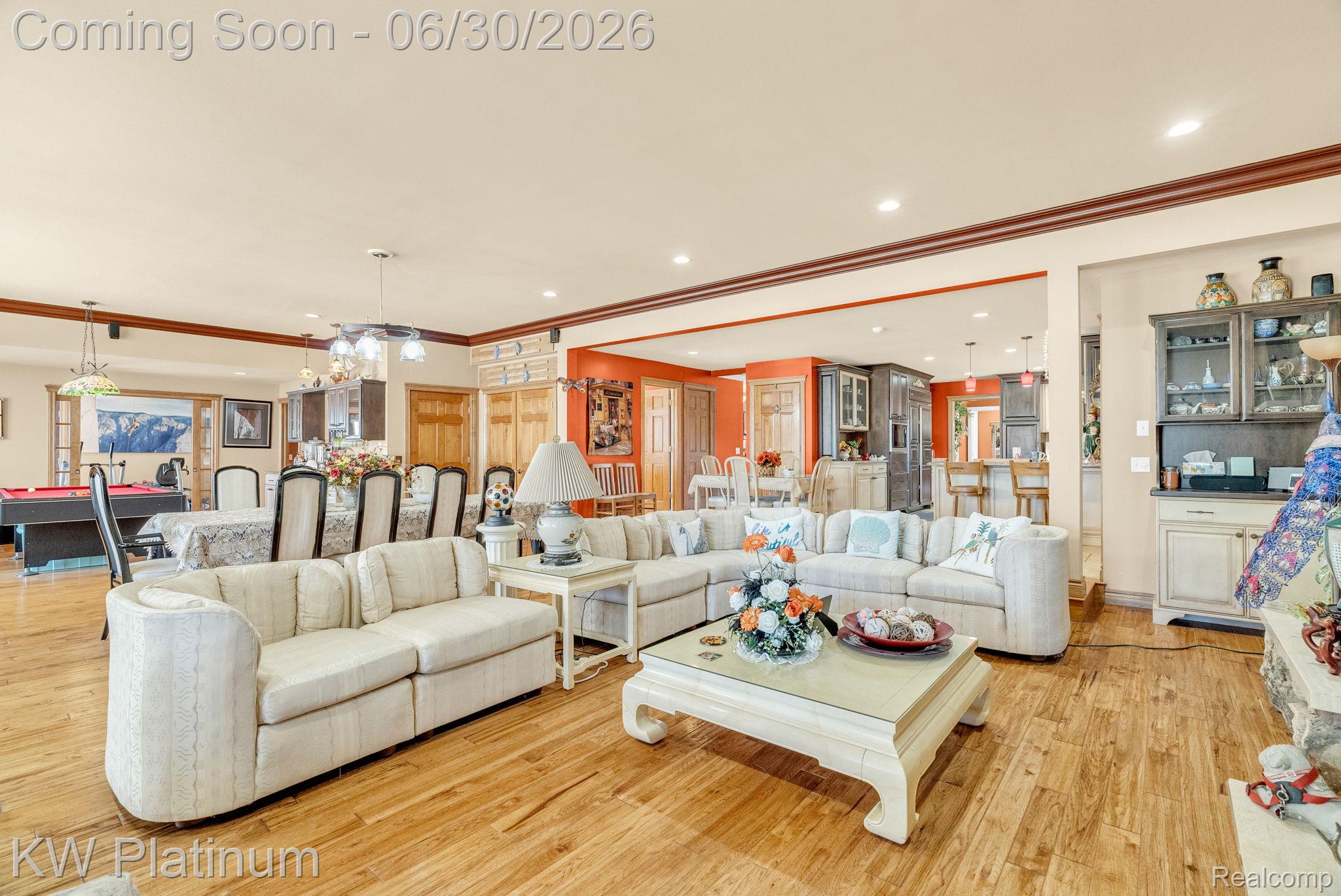 2235 South Lake Shore Road Harbor Beach, MI 48441 - Photo 16 of 99 Spacious common area featuring wood-finish flooring, recessed lighting, and crown molding