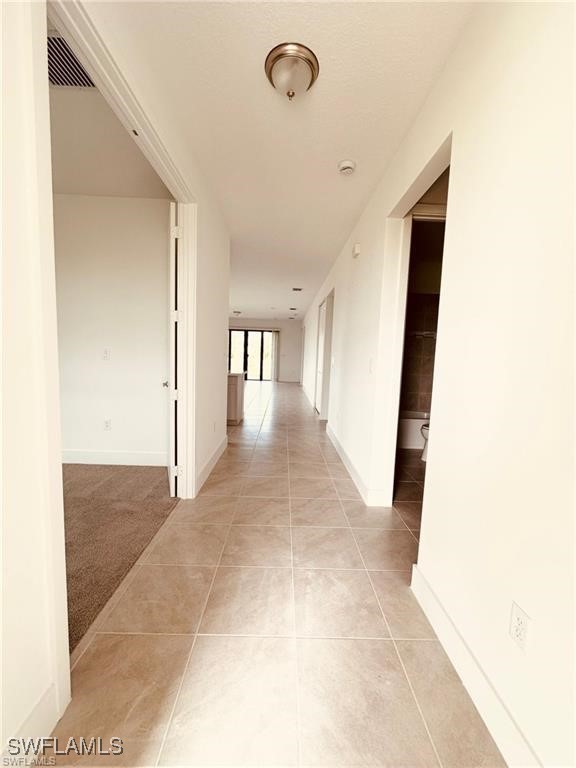 5221 Marano Drive Immokalee, FL 34142 - Photo 7 of 40 a view of a hallway