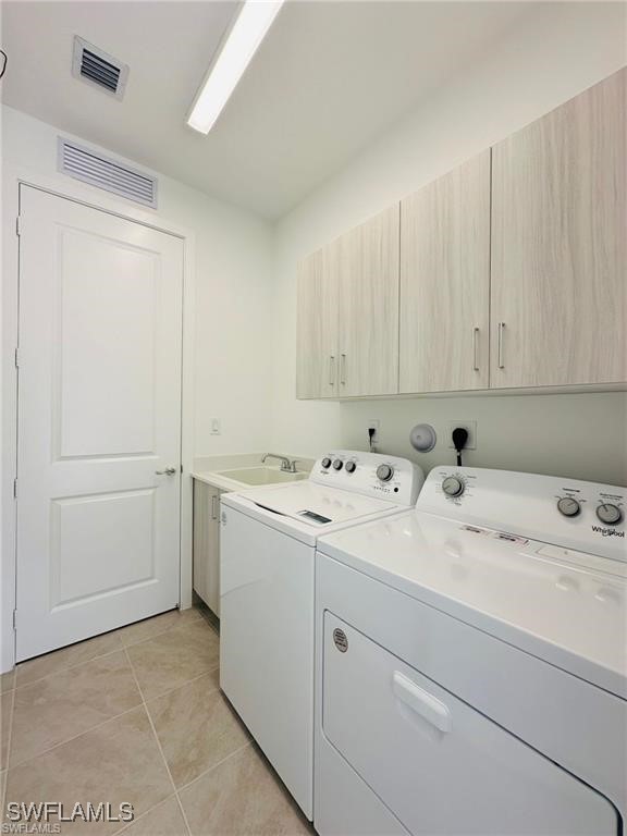 5221 Marano Drive Immokalee, FL 34142 - Photo 10 of 40 a utility room with dryer and washer