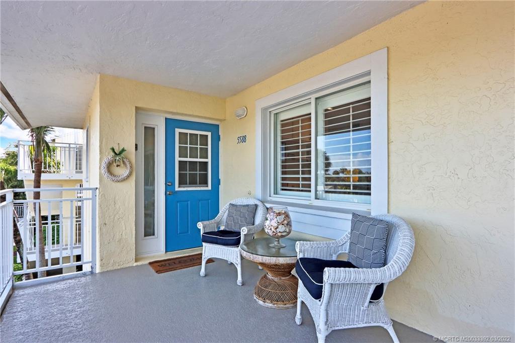 5588 Northeast Gulfstream Way Stuart, FL 34996 - Photo 20 of 23 a dining room with furniture and window