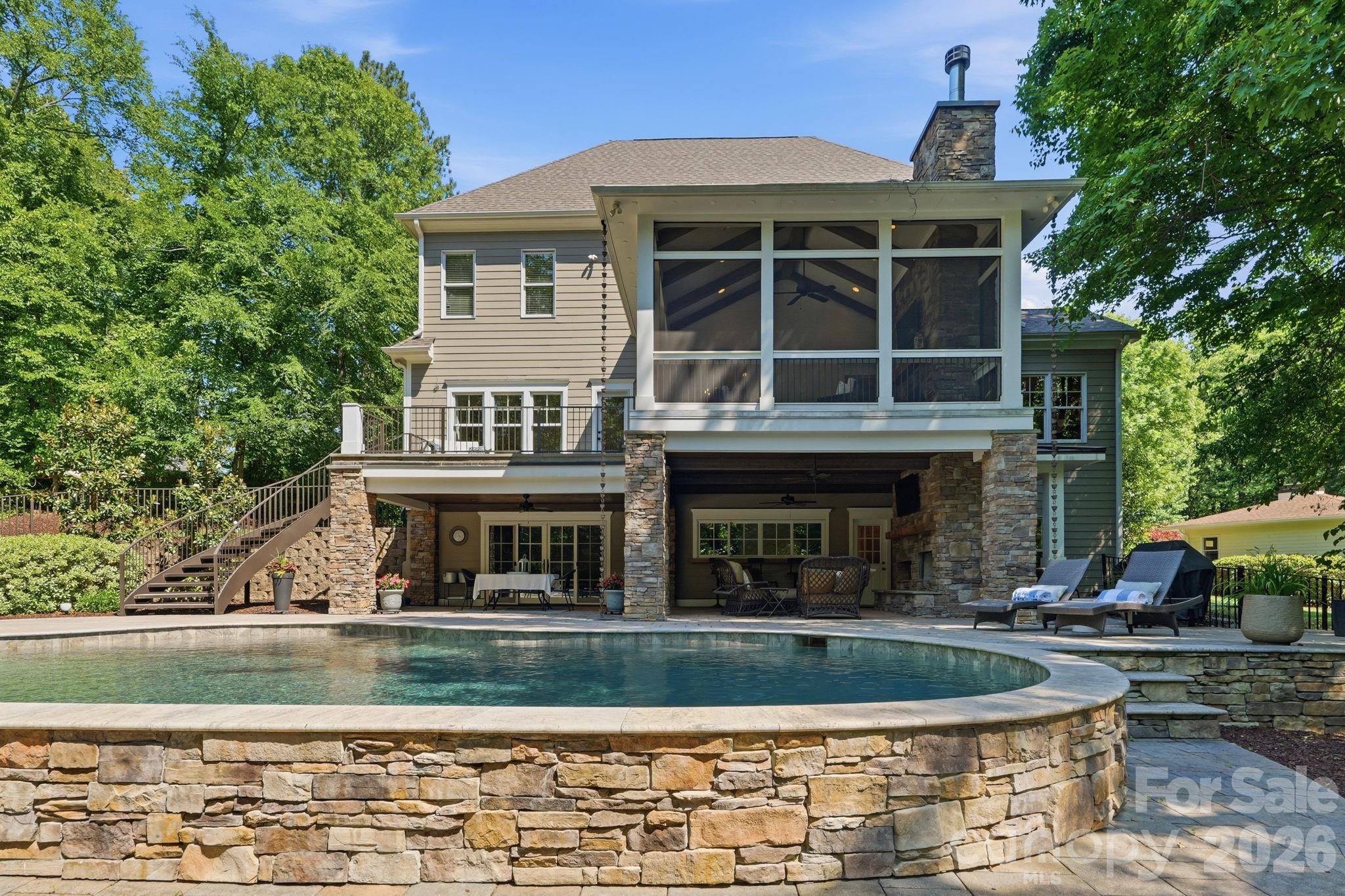 235 Grey Road Davidson, NC 28036 - Photo 38 of 42 a view of house with a swimming pool