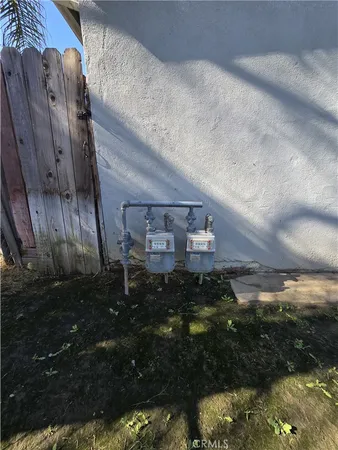 a view of a backyard of the house