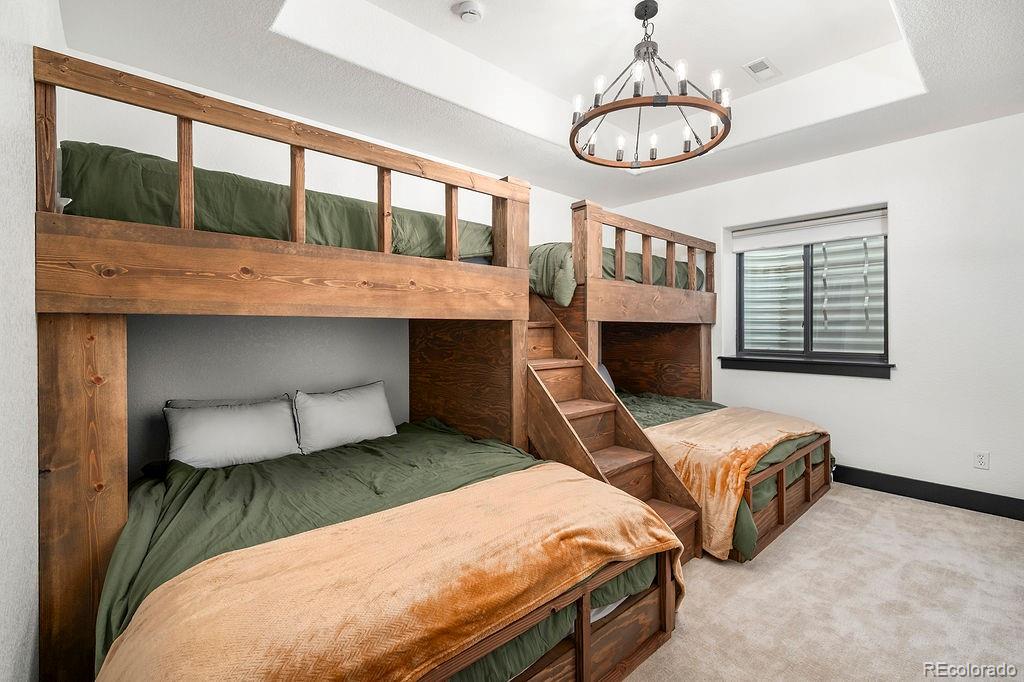 16654 South 7th Street Pine, CO 80470 - Photo 27 of 50 a bedroom with bed and a window