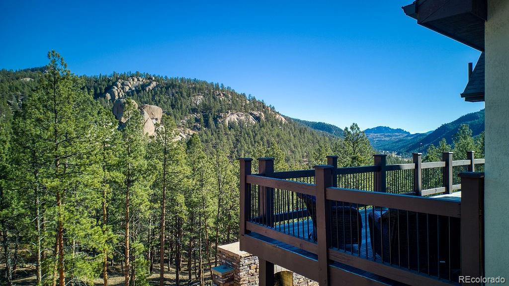 16654 South 7th Street Pine, CO 80470 - Photo 41 of 50 a view of a balcony with an outdoor space and seating area