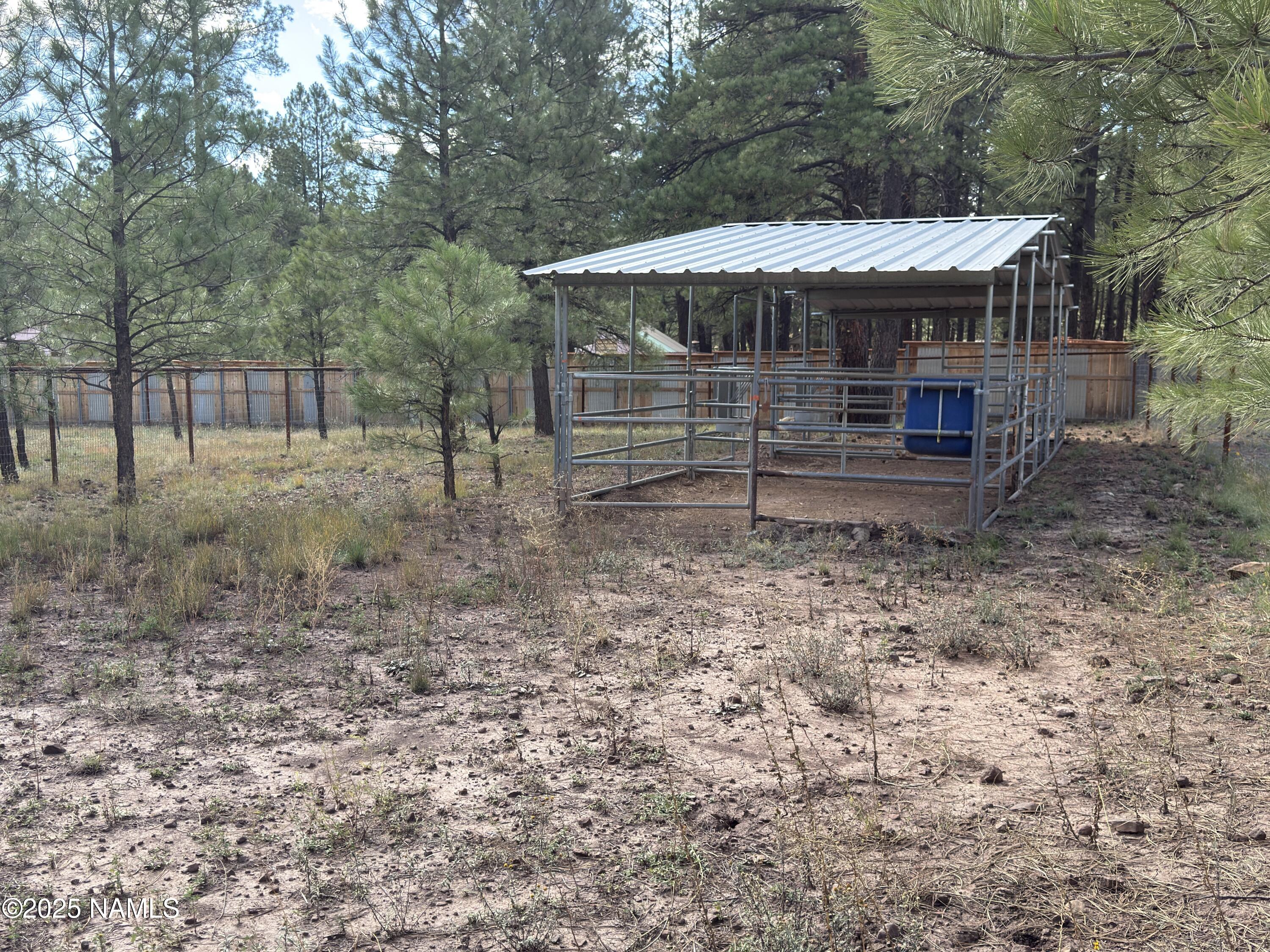 7261 East Long Bow Drive Williams, AZ 86046 - Photo 4 of 43 a view of a house with a yard