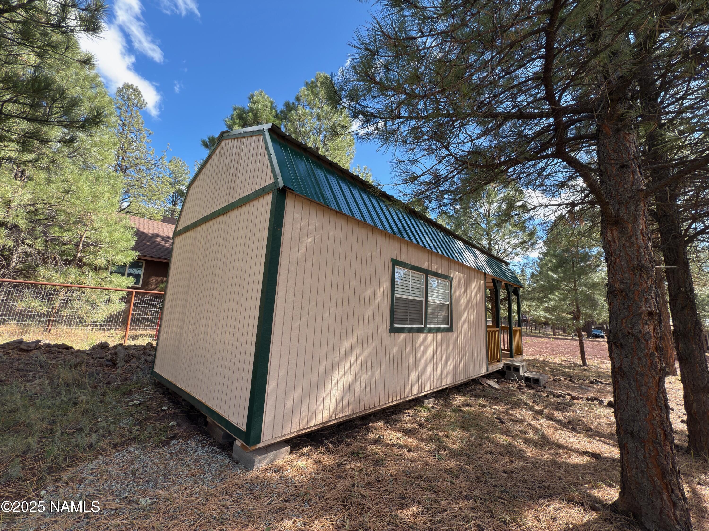 7261 East Long Bow Drive Williams, AZ 86046 - Photo 41 of 43 a view of backyard with tub and trees