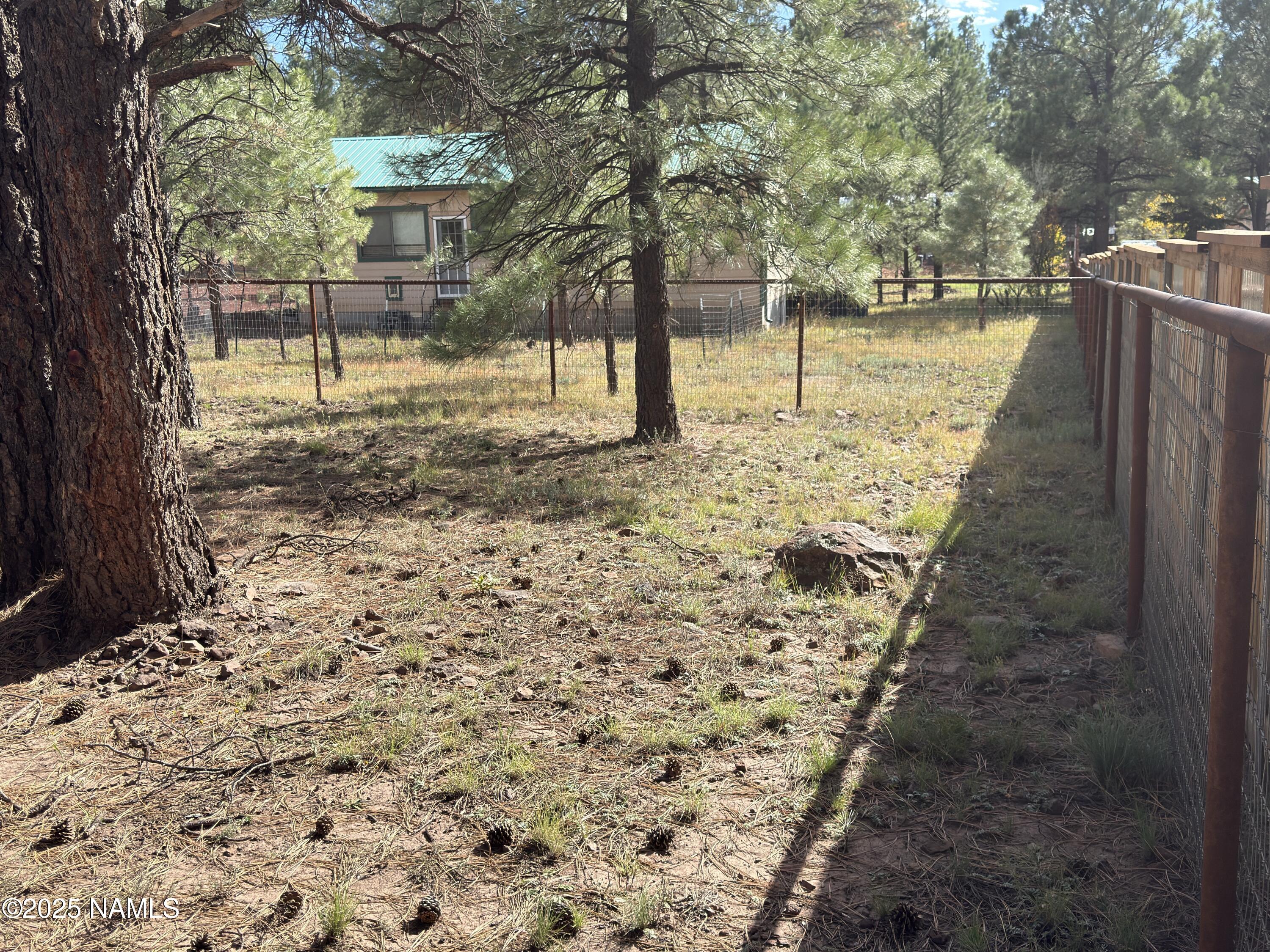 7261 East Long Bow Drive Williams, AZ 86046 - Photo 5 of 43 a view of a pathway with a yard