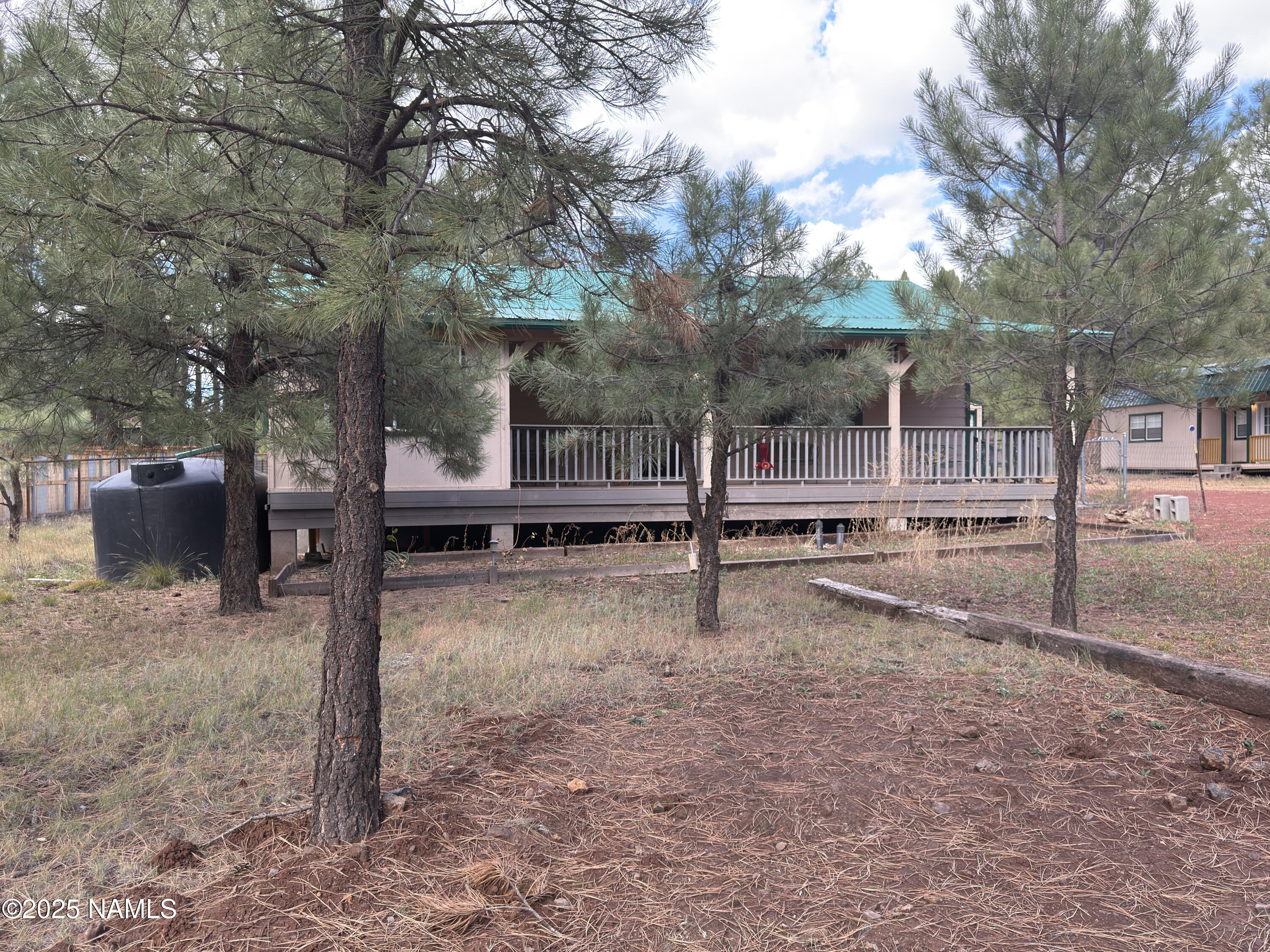7261 East Long Bow Drive Williams, AZ 86046 - Photo 9 of 43 a backyard of a house
