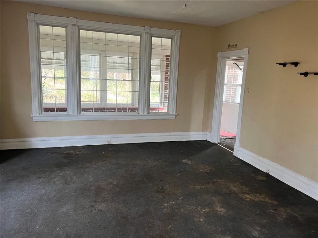 327 3rd Street Leechburg, PA 15656 - Photo 2 of 21 an empty room with a window