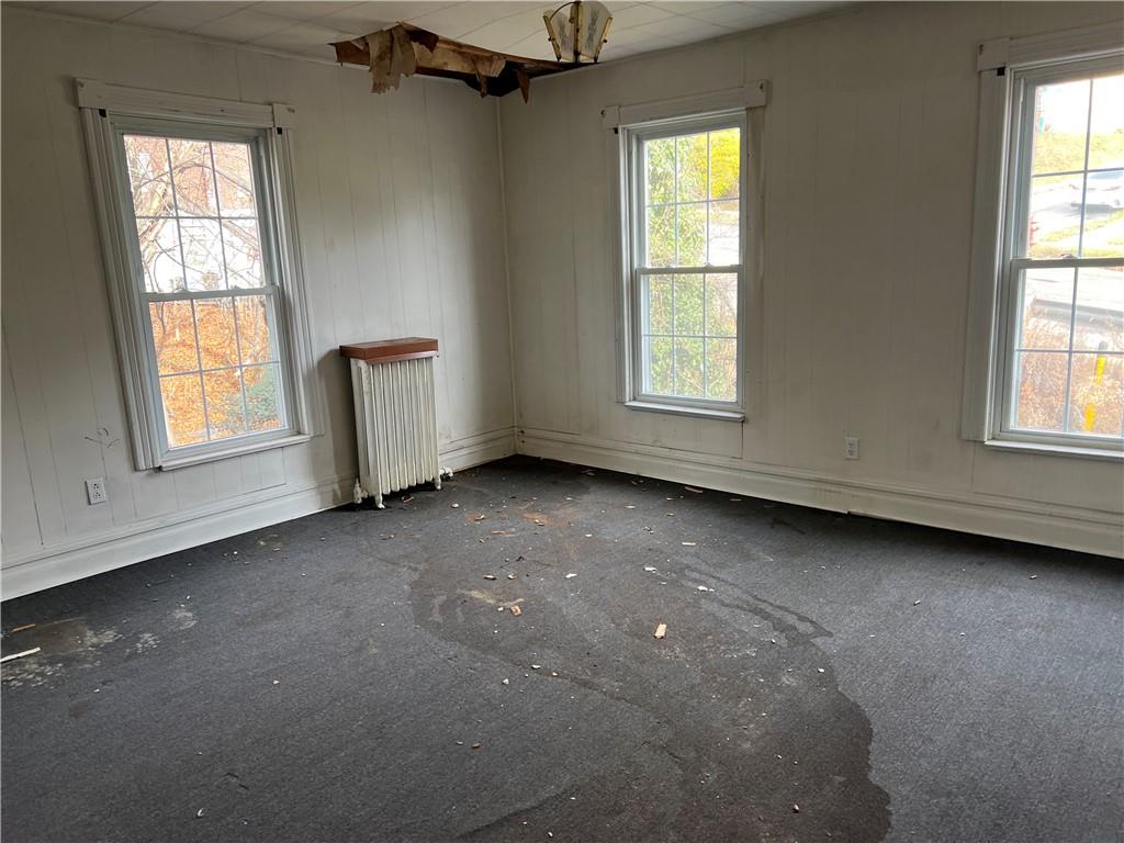 327 3rd Street Leechburg, PA 15656 - Photo 6 of 21 an empty room with windows