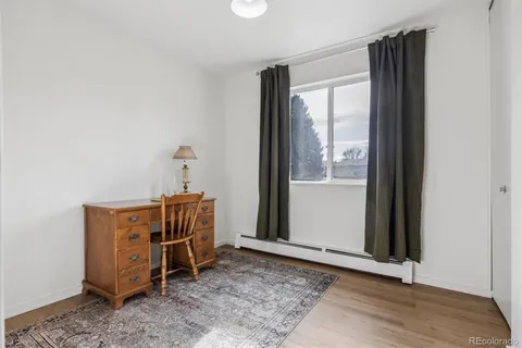 a view of a livingroom with furniture