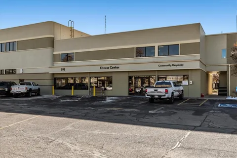 a view of a car park in front of house
