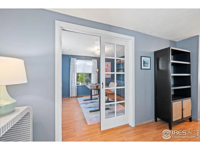 a bathroom with a sink mirror vanity and toilet